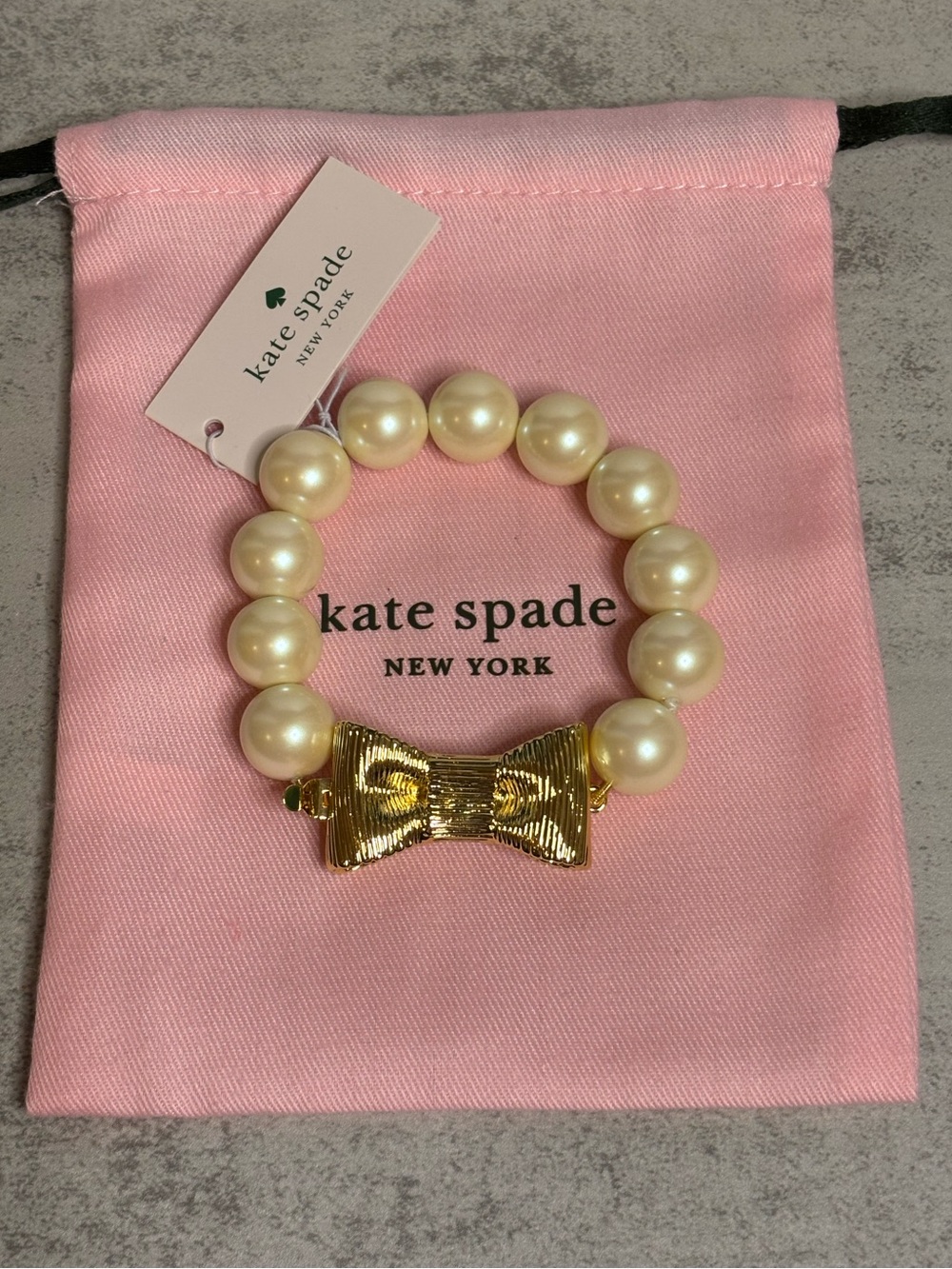 Kate Spade All Wrapped Up Faux Pearl Bracelet with Gold Bow Closure - Picture 6 of 10